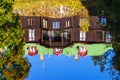 Old manor house reflection in the water Royalty Free Stock Photo