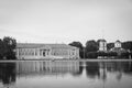 Old manor house from shore of pond black and white Royalty Free Stock Photo