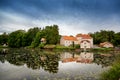 An old manor house Vihula in Estonia, Lahemaa park. Beautiful summer landscape with pond Royalty Free Stock Photo