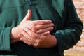 Old mans right hand. Pain, arthritis. Royalty Free Stock Photo