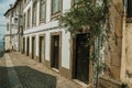 Old mansion with stone decoration in a deserted alley