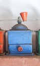 Old manual colorful coffee grinder