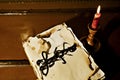 Old manuscript and candle