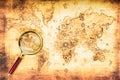 Old map with an magnifying glass Royalty Free Stock Photo