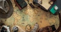 Old map, vintage travel equipment and souvenirs from the travel around the world
