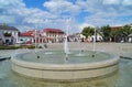 Old market square and fountain in Lowicz, Poland