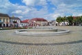 Old market square and fountain in Lowicz, Poland