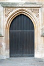 Old massive church door Royalty Free Stock Photo