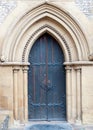 Old massive church door of the catholic church Royalty Free Stock Photo