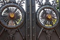 Old massive iron gate with national ukrainian coat of arms trident
