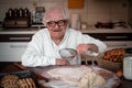 old master baker kneads bread Royalty Free Stock Photo