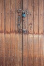 Old master key on wood door Royalty Free Stock Photo