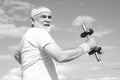 Old mature man exercising with dumbbell. Senior sportsman in sport center. Health club or rehabilitation center for Royalty Free Stock Photo