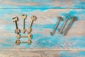 Old meal keys on wooden background