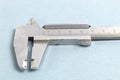 Old mechanical caliper. Scale on the body of the measuring device.