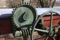 Old mechanism with a cogwheel and a worm gear Royalty Free Stock Photo