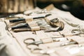 Old Medical And Surgical Instruments. Many Surgical Instruments For Surgery. Old Different Metal Medical Instruments