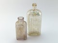 Old medicine bottles on white background Royalty Free Stock Photo