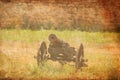 Old medieval cannon on grass near fortress wall Royalty Free Stock Photo