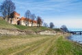 Old medieval castle near river in Bauska town, Latvia Royalty Free Stock Photo