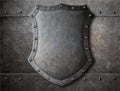 Old medieval coat of arms shield over armour Royalty Free Stock Photo