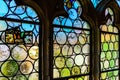 Old medieval colorful leaded-pane windows in gothic style Royalty Free Stock Photo