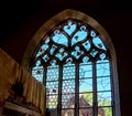 Old medieval colorful leaded-pane windows in gothic style Royalty Free Stock Photo