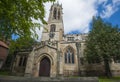 Old medieval english church with clock tower Royalty Free Stock Photo