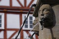 Old medieval fountain close up gargoyle