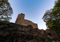 Old medieval hilltop castle Bernstein in Alsace. The ruins of a historic fort are built on a cliff