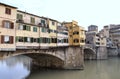 Florence old Italian town medieval buildings urban panorama beautiful cityscape water bridge sky background Royalty Free Stock Photo