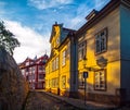 Old medieval narrow cobbled street and small ancient houses of Novy Svet, Hradcany district, Prague, Czech Republic Royalty Free Stock Photo