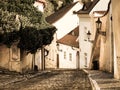 Old medieval narrow cobbled street and small ancient houses of Novy Svet, Hradcany district, Prague, Czech Republic Royalty Free Stock Photo