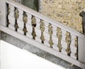 Old medieval stairs fence with concrete stone vintage pillars.