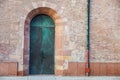 Old medieval style door in Italy Royalty Free Stock Photo