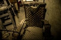 Old medieval torture chamber with chair and tools Royalty Free Stock Photo