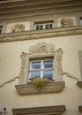 Old medieval window with stucco Royalty Free Stock Photo