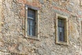 Old medieval windows on the wall of the Old Castle and town Ozalj Royalty Free Stock Photo