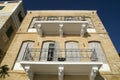 Old mediterranean facade with balconies in Greece