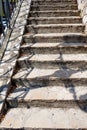 Old Mediterranean and medieval style stone stairs in old European town Royalty Free Stock Photo