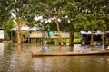 Old men doing canoeing at amazon river