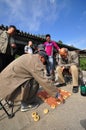 Old men playing chess in a park in Spring