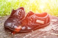 Old men`s shoes. Abandoned on the street after a rain. Worn and Royalty Free Stock Photo