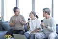 Old men and women karaoke in the living room. Senior friends group hangout, Older people meeting Royalty Free Stock Photo