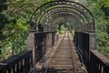 Old, metal, arched railway bridge in Sri Lanka Royalty Free Stock Photo