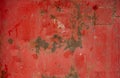 Old metal background. Texture of the old dried red paint on a rusty metal surface Royalty Free Stock Photo