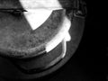 Old metal barrel cap top angle black and white shot Royalty Free Stock Photo