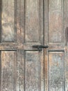 Old metal bolt on the wooden door background. Royalty Free Stock Photo