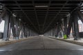 Old metal bridge tunnel perspective