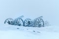 Old metal cannons covered with snow Royalty Free Stock Photo